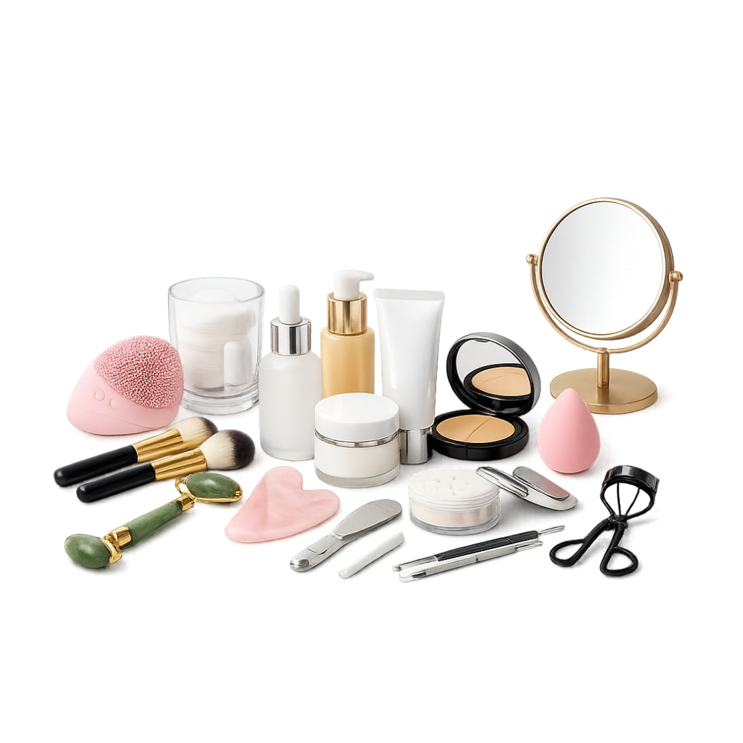 Collection of makeup and skincare products with tools on a white background
